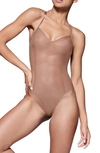 Item M6 All Mesh Thong Bodysuit In Milk Chocolate