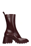 CHLOÉ BETTY HIGH HEELS ANKLE BOOTS IN BORDEAUX RUBBER/PLASIC,CHC19W239G8601