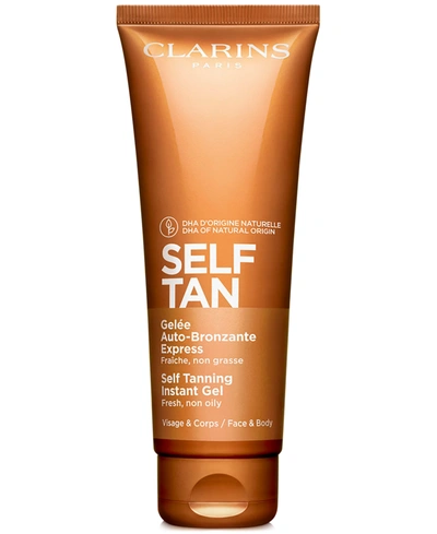 CLARINS SELF TANNING FACE & BODY TINTED GEL, 4.4 OZ.