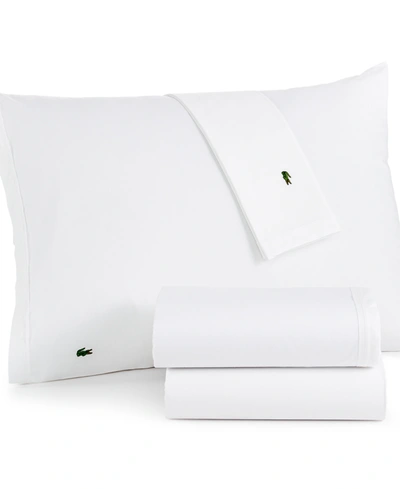 Lacoste Home Solid Cotton Percale Pillowcase Pair, Standard In White