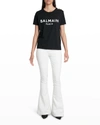 Balmain Black Crewneck T-shirt With Logo Print And Golden Buttons In Jersey Woman In White/black