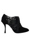 Dolce & Gabbana Solid Color Ankle Boots In Black