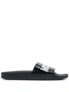 Moschino Logo Embossed Slides In Black