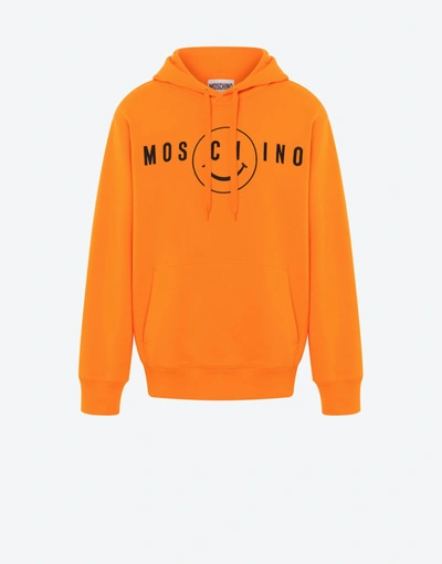 Moschino Logo Printed Drawstring Hoodie In Orange