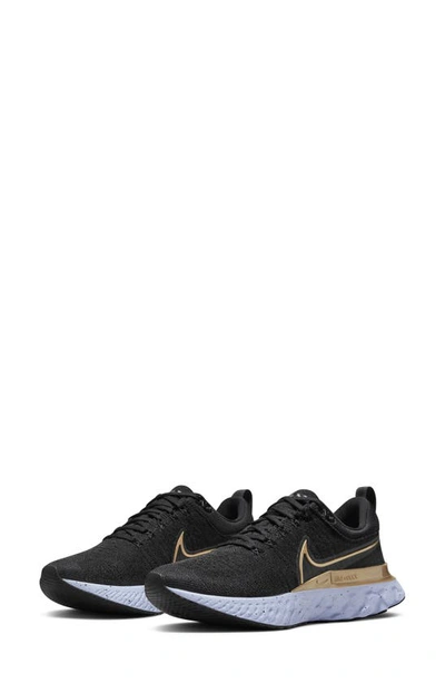 Nike Women's React Infinity Run Flyknit 2 Running Sneakers From Finish Line In Black,m Gold-tone