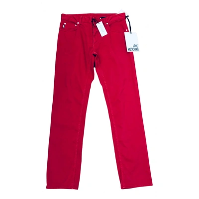 Pre-owned Moschino Love Trousers In Red