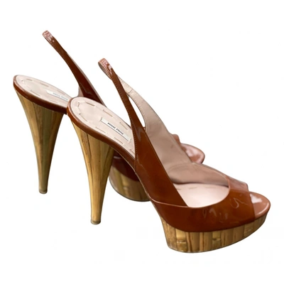 Pre-owned Miu Miu Patent Leather Sandals In Brown