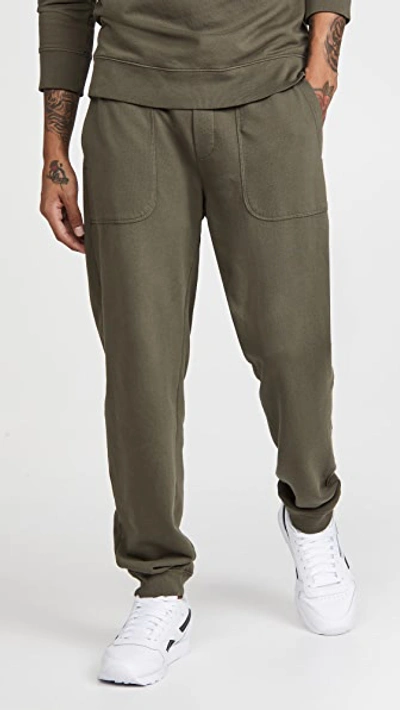 Vince Garment Dye Joggers In Washed Buckeye Olive