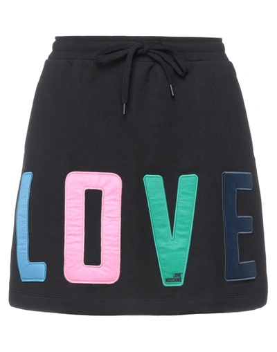 Love Moschino Mini Skirts In Black