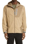And Wander Water Repellent Stretch Shell Jacket In Beige
