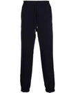 Alexander Mcqueen Tapered-leg Track Pants In Blau