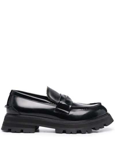 Alexander Mcqueen Seal Logo Leather Penny Loafers In Black