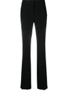 Moschino High Waisted Flared Trousers In Black