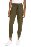 Alo Yoga Soho Sweatpants In Dark Olive