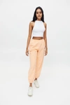P.e Nation Grand Stand Tapered-leg Mid-rise Organic-cotton Jogging Bottoms In Peach