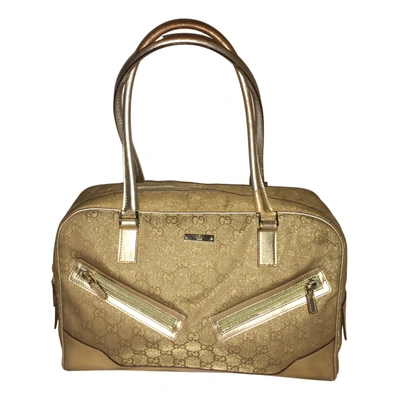 Pre-owned Gucci Cloth Handbag In Gold