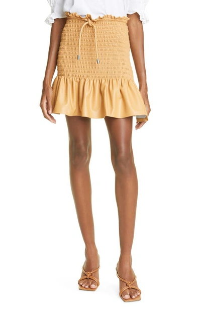 Jenny Smocked Ruffle Faux Leather Miniskirt In Petite Grain