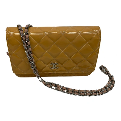 Pre-owned Chanel Wallet On Chain Timeless/classique Patent Leather Crossbody Bag In Yellow