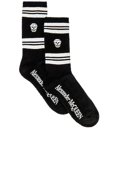 Alexander Mcqueen Man Black And White Skull Socks In Black Ivory