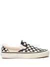 Vans Classic Slip On In Checkerboard Print In White And Black With White Stripe In White