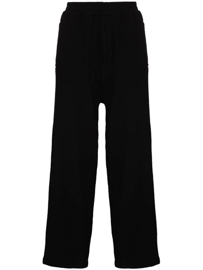 Undercover Loose-fit Wool Track Trousers In Black