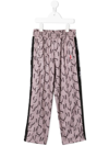 Msgm Monogram Print Trousers In Brown