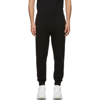 Alexander Mcqueen Graffiti-logo Cotton-jersey Track Pants In Black