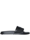 Fendi Embossed Ff Motif Rubber Slides In Black