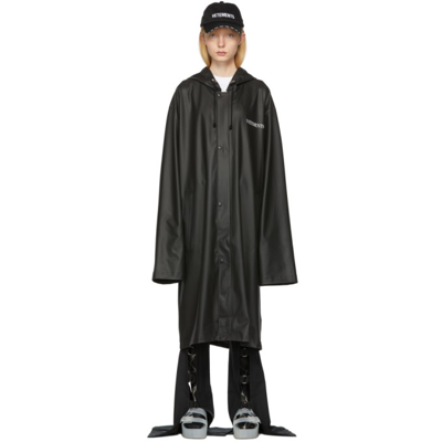 VETEMENTS BLACK FASHION IS MY PROFESSION LOGO RAINCOAT 
