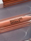 Beauty Care Naturals Lip Gloss In Brown