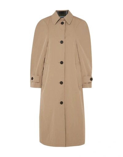 Pushbutton Overcoats In Beige