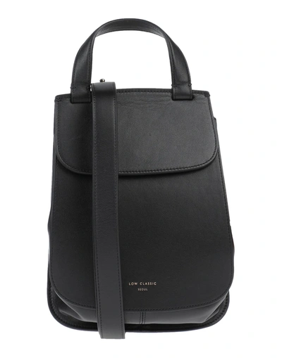 Low Classic Handbags In Black