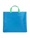 Comme Des Garçons Handbags In Blue