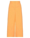 Msgm Cropped Pants In Orange