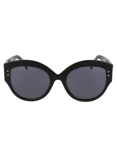 Alaïa Round Acetate Sunglasses W/ Perforated Arms In Black