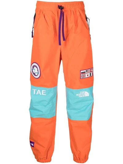 The North Face Ctae Panelled Logo-patch Joggers In Orange