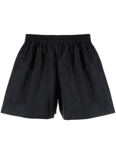Red Valentino Pleated Flared Shorts In Black