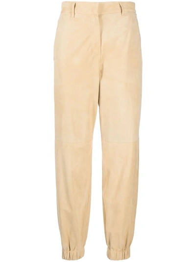 Brunello Cucinelli Cuffed-ankle Leather Trousers In Nude