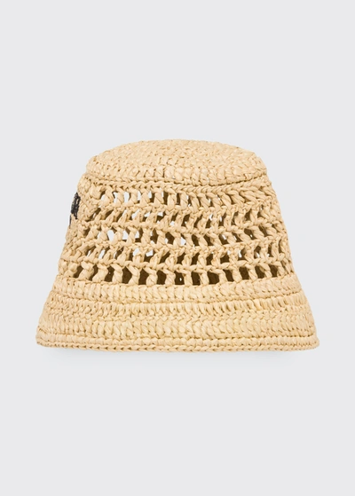 Prada Logo Cutout Raffia Bucket Bag In Beige
