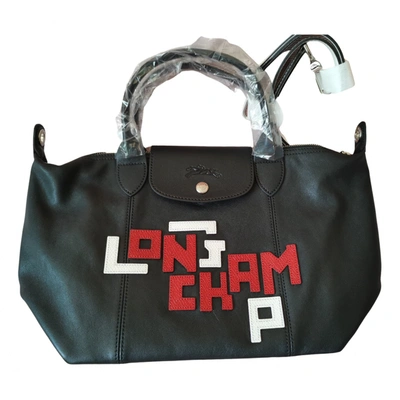 Pre-owned Longchamp Pliage Leather Bag In Black