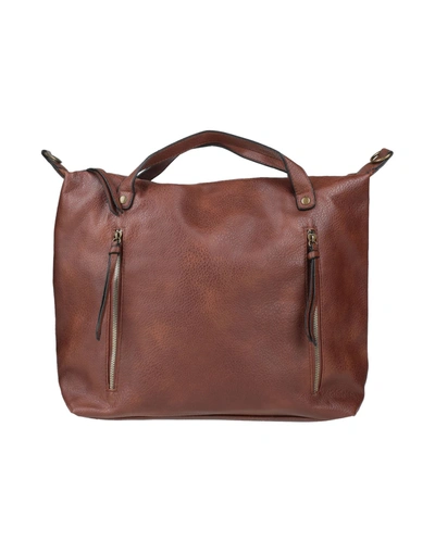 Maury Handbags In Brown