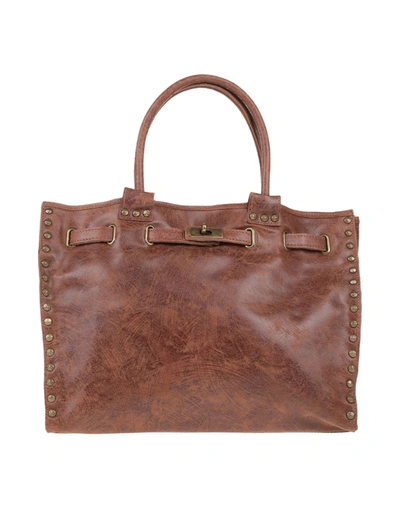 Maury Handbags In Tan