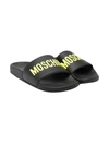 MOSCHINO BLACK SLIPPERS WITH YELLOW LOGO
