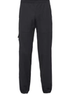 Prada Tapered-leg Virgin Wool Trousers In Black