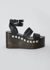 ALAÏA 85MM WOODEN-HEEL WEDGE SANDALS WITH VIENNE LEATHER STRAPS AND STUDS