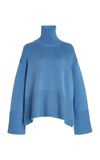 Totême Ribbed Wool And Organic Cotton-blend Turtleneck Sweater In Blue