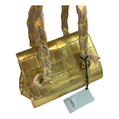 Pre-owned Malo Crocodile Handbag In Gold