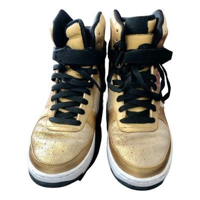 Pre-owned Nike Air Force 1 Patent Leather Trainers In Gold