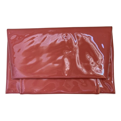 Pre-owned Bimba Y Lola Patent Leather Clutch Bag In Orange
