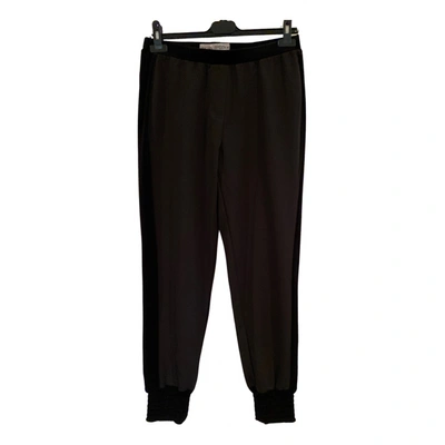 Pre-owned Ashley B Trousers In Black